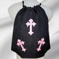 Black drawstring bag with pink crosses and embellished in rhinestones